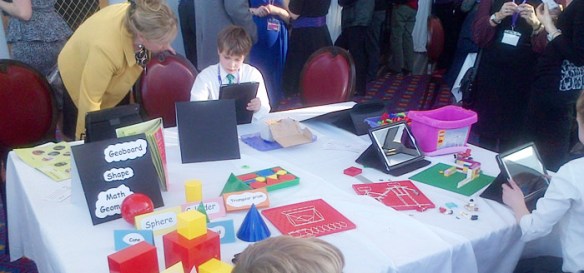 Schoolchildren immersed in the accompanying exhibition